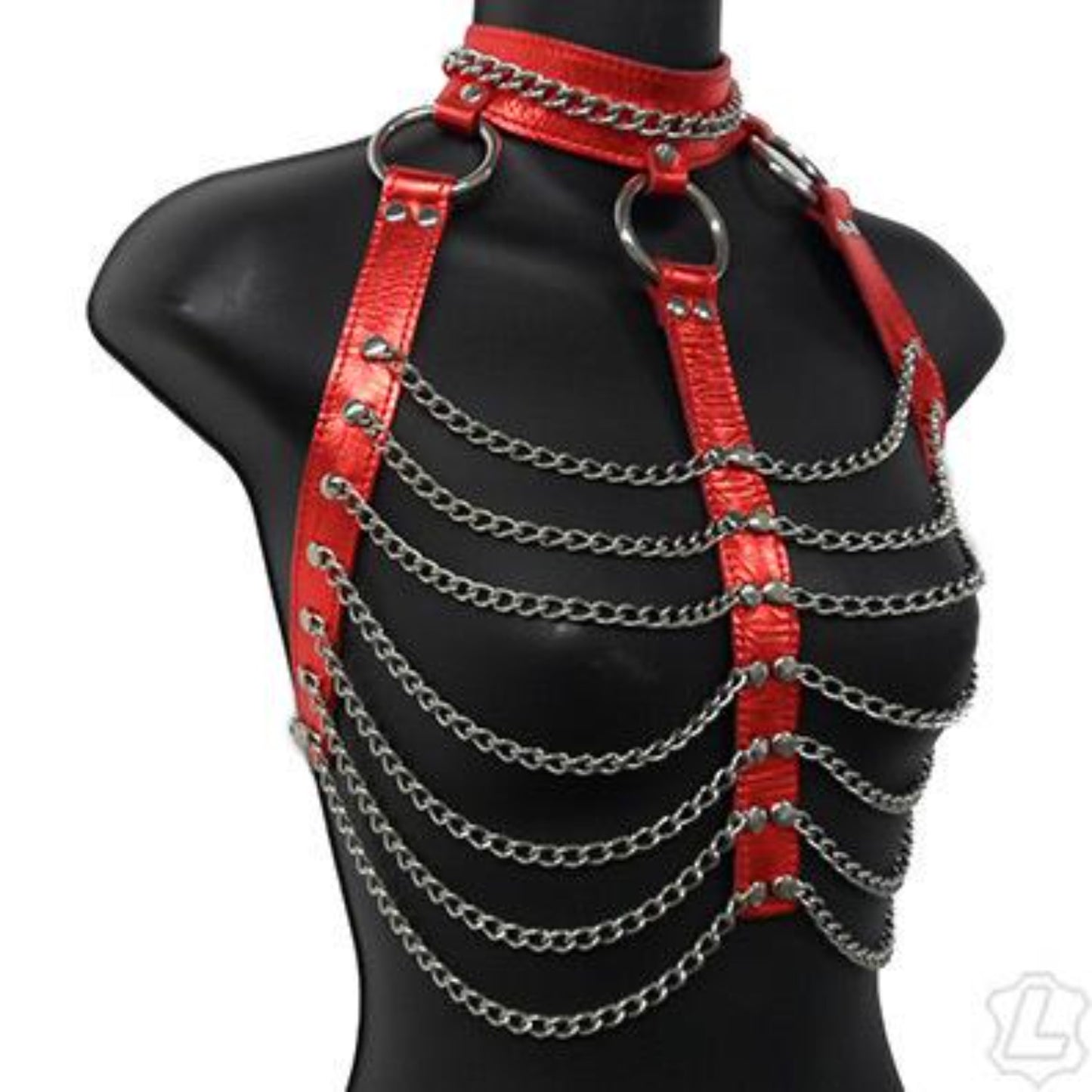 The red leather and chain three column halter harness on a mannequin.