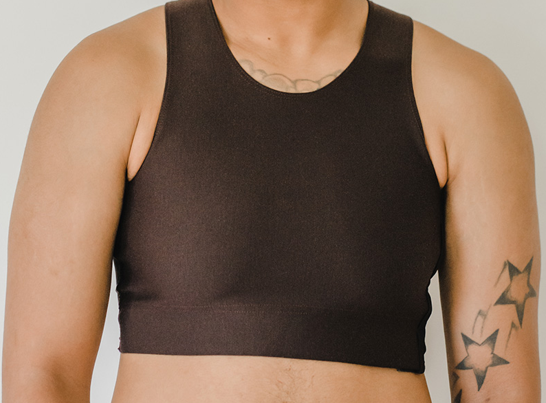 The torso of a model wearing the brown BURSLF Crop Binder.