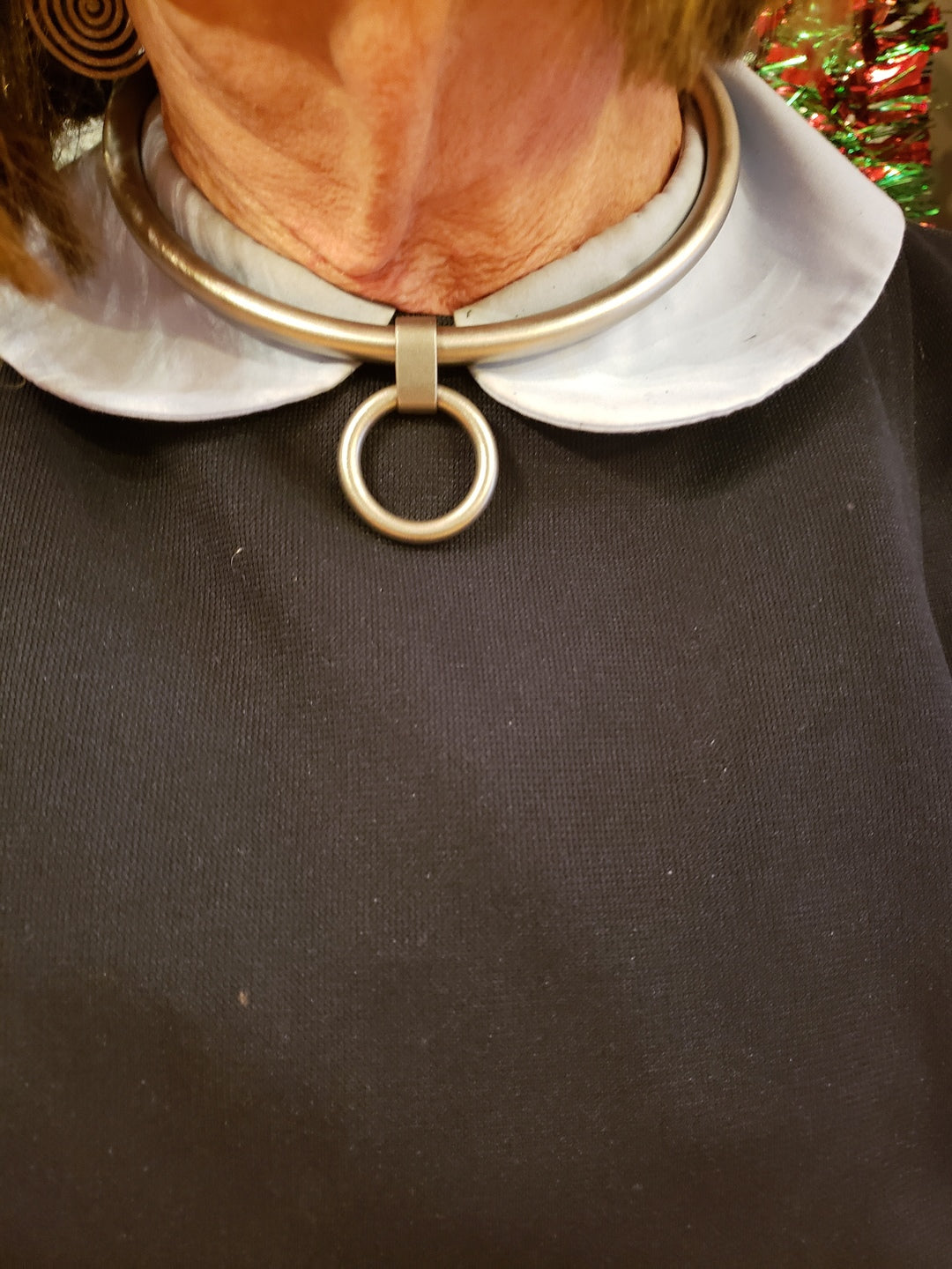 A closeup of the A model wearing the Talena Collar.