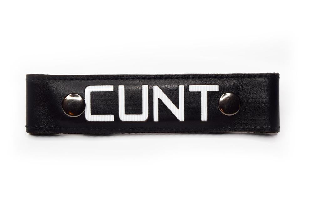 Glow Center Strap, "CUNT".