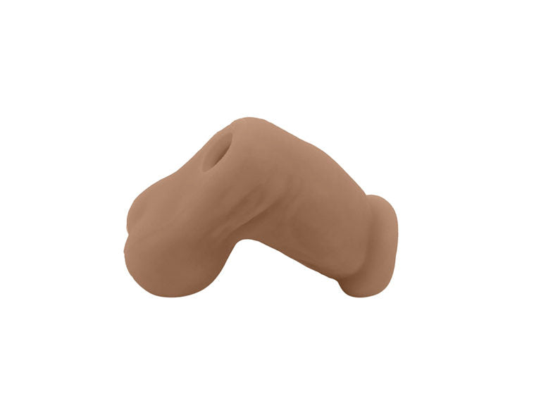 A profile shot of the caramel Jack Sleeve Stroker & Packer Dildo.