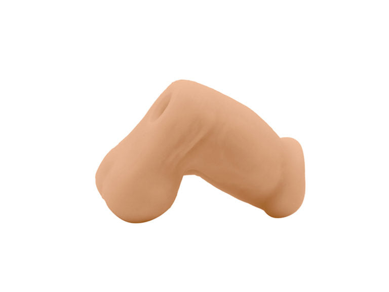 A profile shot of the cashew Jack Sleeve Stroker & Packer Dildo.