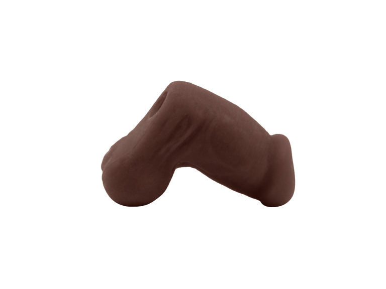 A profile shot of the chocolate Jack Sleeve Stroker & Packer Dildo.