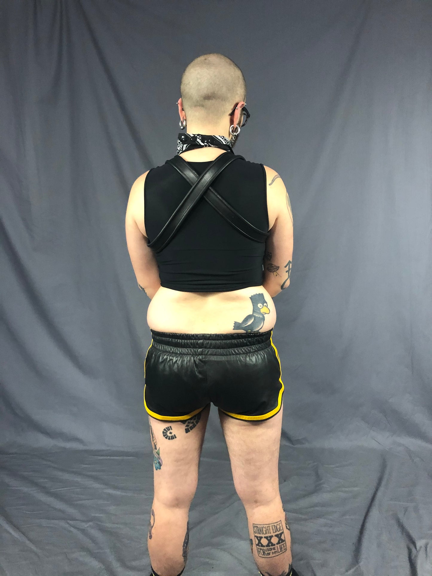 Back view of the black and yellow prowler leather sport shorts.