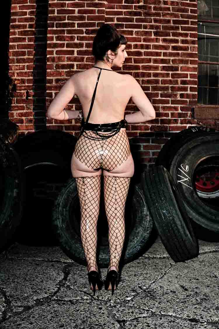 Latex Fishnet Stirrup Stockings, rear view.
