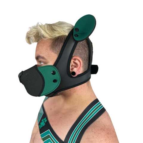 Model wearing green neoprene snap-on K-Br muzzle, left side, with snap on Green bear ears.