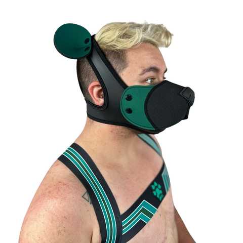 Model wearing green neoprene snap-on K-Br Muzzle, right side, with snap on green bear ears.