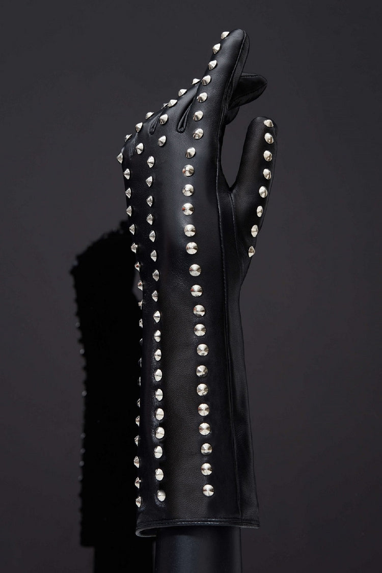 The outside of the Spiked Leather Forearm Glove on a mannequin hand.