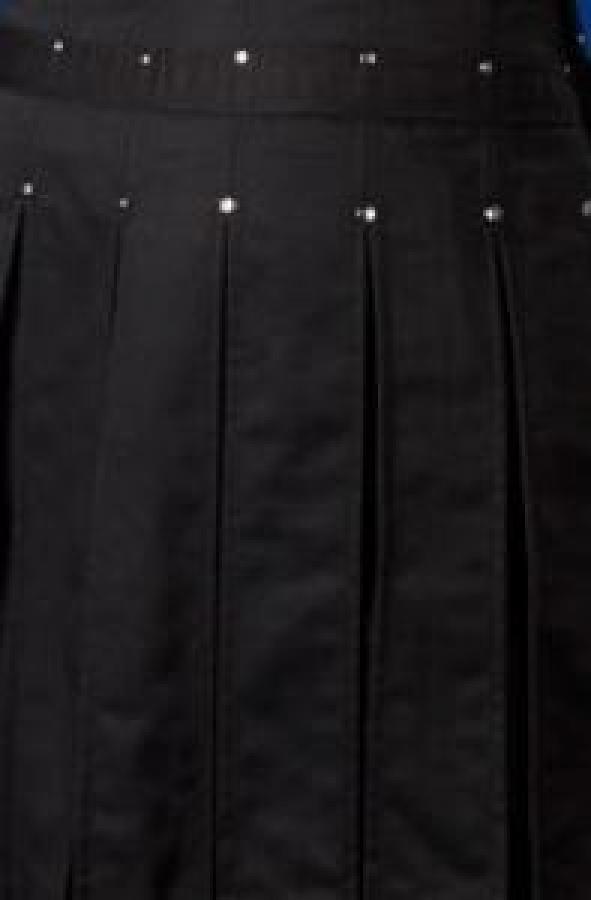 A closeup of the black kilt with chrome rivets.