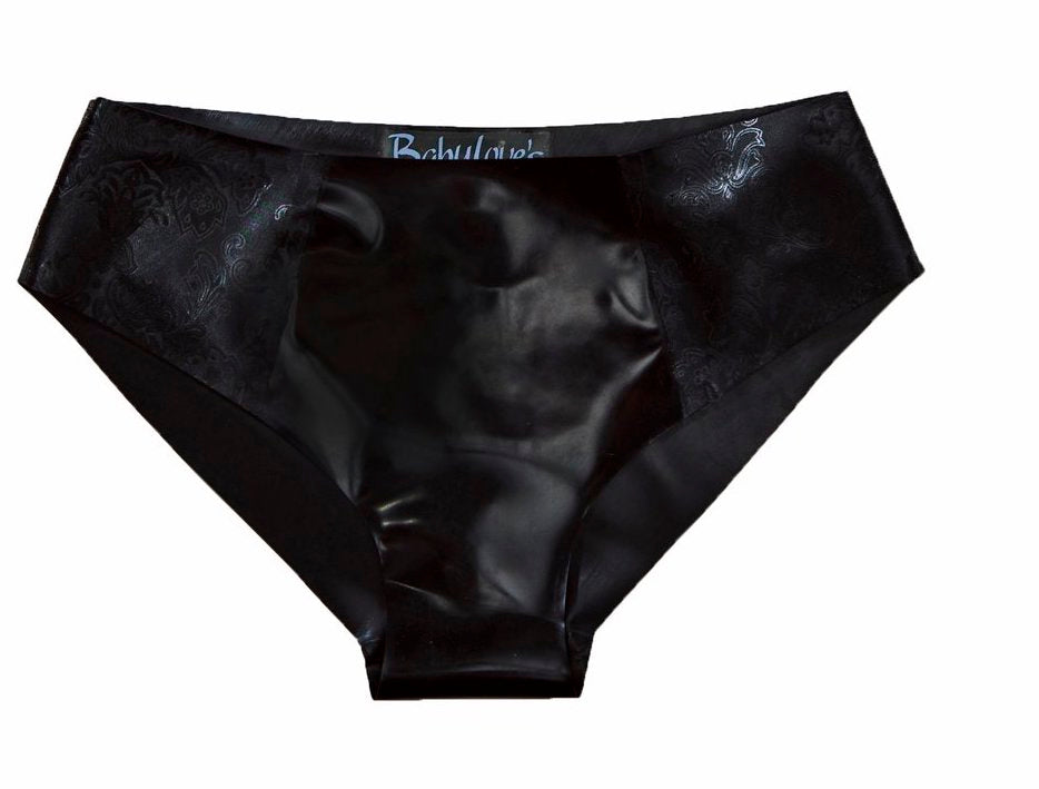 A close up of the black and black etched floral Specialty Latex Panel Panty.