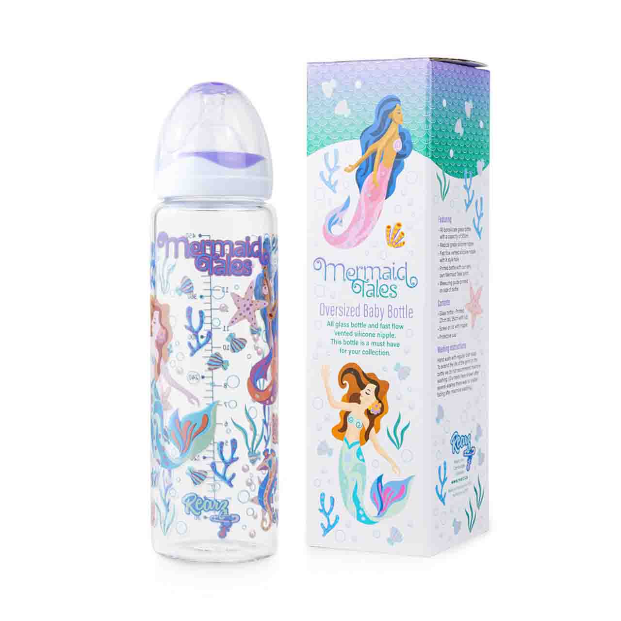 Glass Mermaid Tales Adult Baby Bottle sitting next to its box.