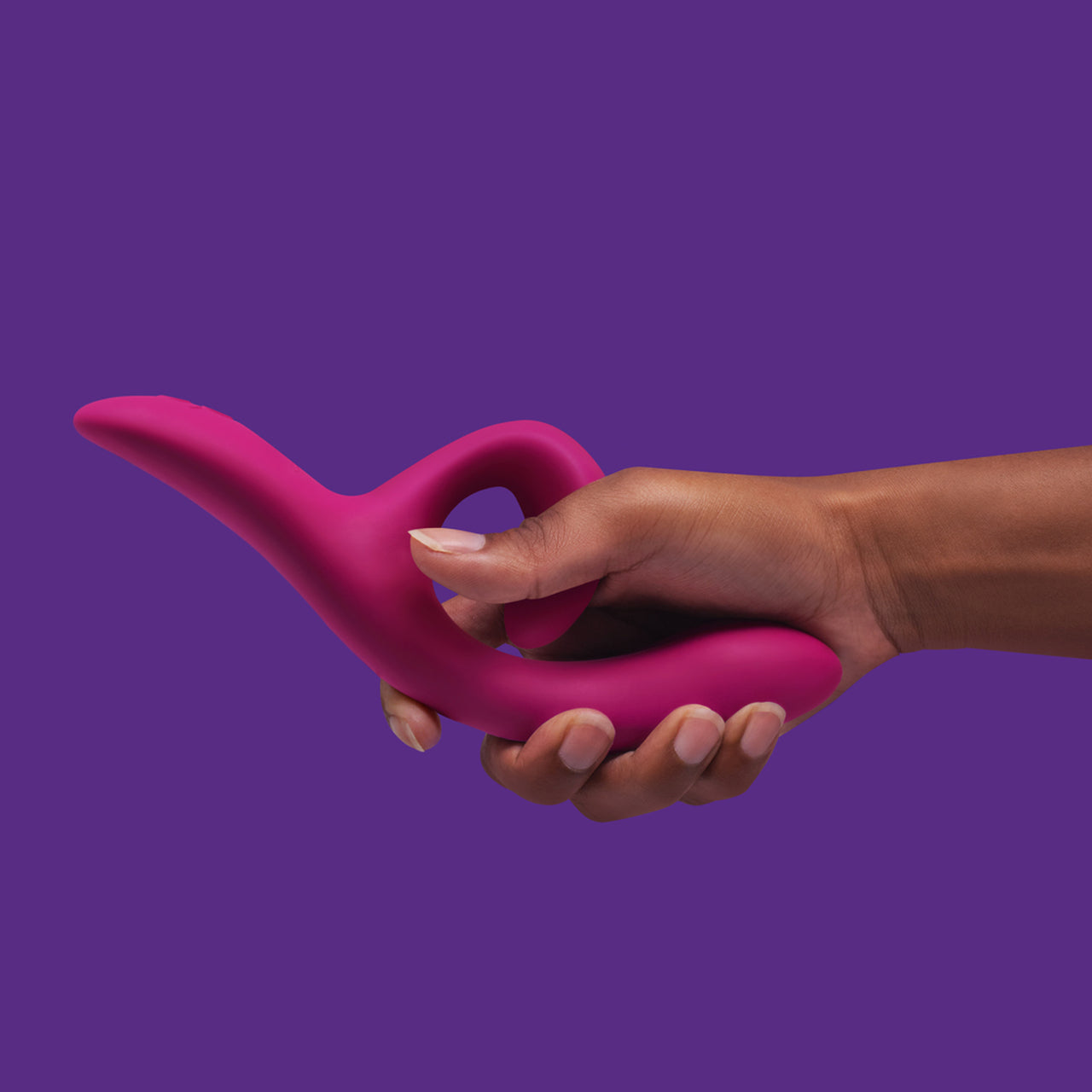 A hand holding The We-Vibe Nova 2.0 Remote Vibrator.