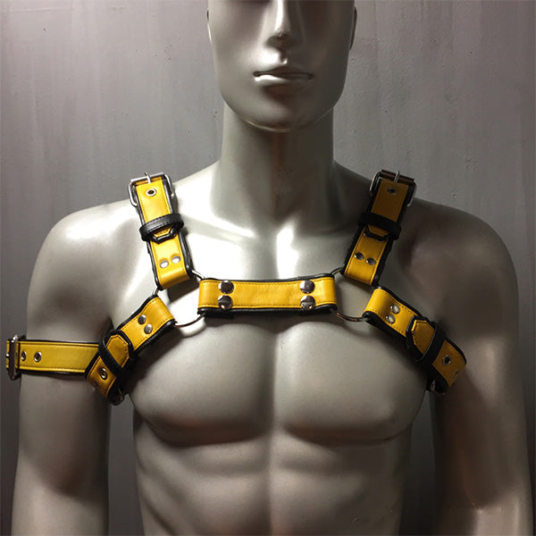 Yellow leather overlay 6 strap bulldog harness with removable snap center on a mannequin.