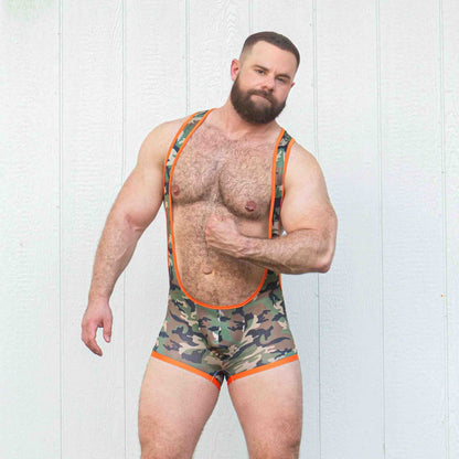 A model wearing the Combat Assless Mesh Singlet, front view.
