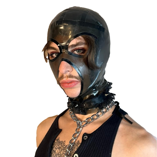A model wearing translucent grey open mouth and eye basic latex hood, front view.