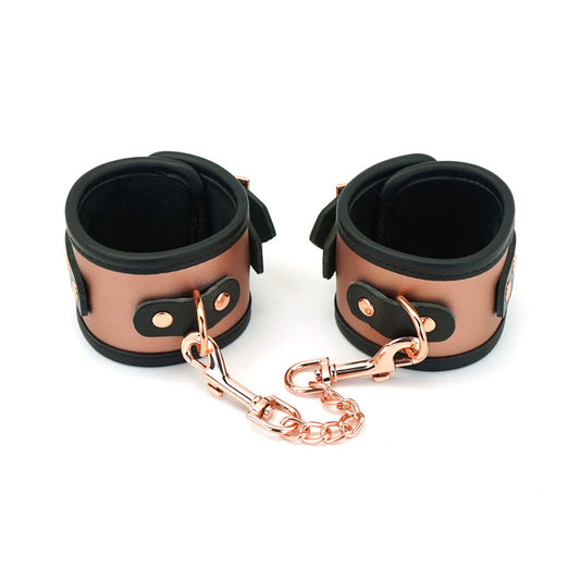 The Rose Gold Memory Leather Cuffs with Faux Fur LIning, buckled and closed.