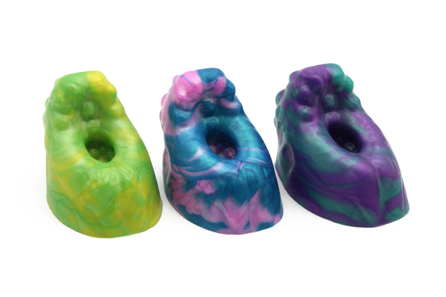 Three Fingo Grinders in different colors.