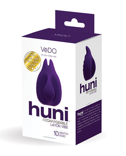 The front of the packaging for the deep purple Vedo Huni Finger Vibe.