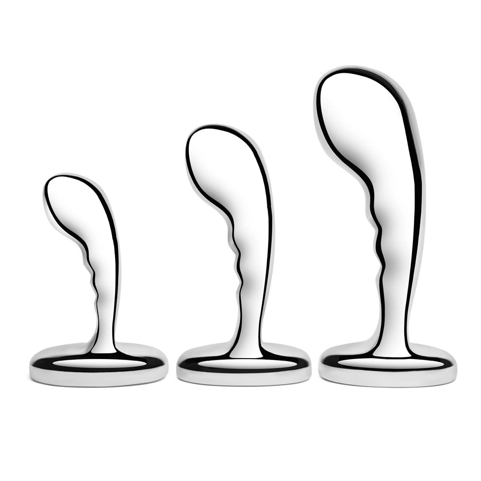 The plugs in the Stainless Steel P-Spot Training Set standing on their bases.