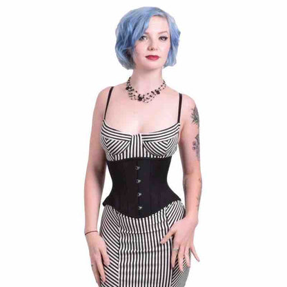 A model wearing the Black Cotton Cashmere Short Cincher - Hourglass over a black and white striped dress, front view.