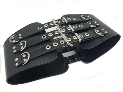 The Leather Kidney Belt with Back Laces laying on its side, buckled side up.
