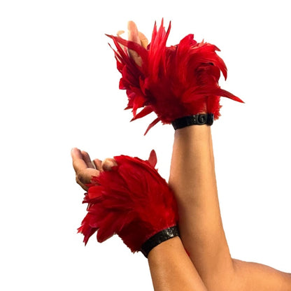 Side view of the Red latex feather cuff on a model's hands.