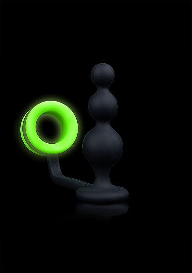 The Glow Beads Butt Plug with Cock Ring glowing in the dark.