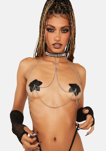 A model wearing the Queen of the Night Reusable Pasties with Chains.