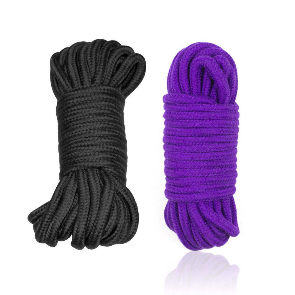 A black and a purple bundle of Shibari Soft Bondage Rope.