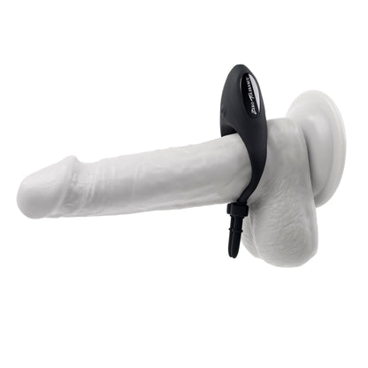 The Perfect Fit Vibrating Cock Ring on a white dildo with suction cup.