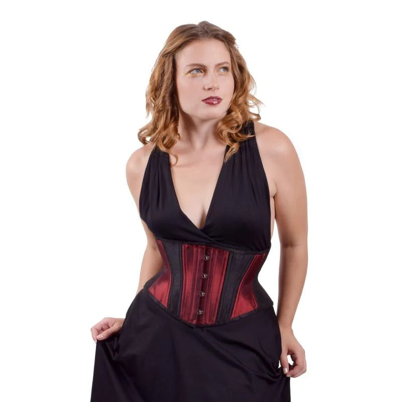 A model wearing the Burgundy & Black Hourglass Short Cincher over a black skirt and top, front view.