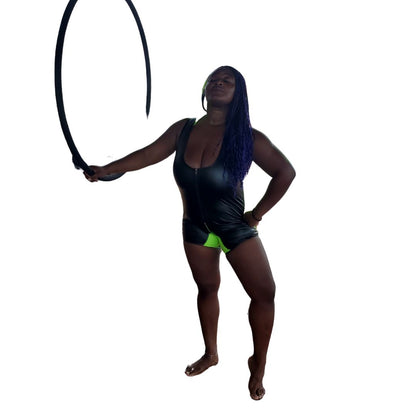 Model wearing Primal Instinct Hooded Singlet with one hand on hoop other on hip