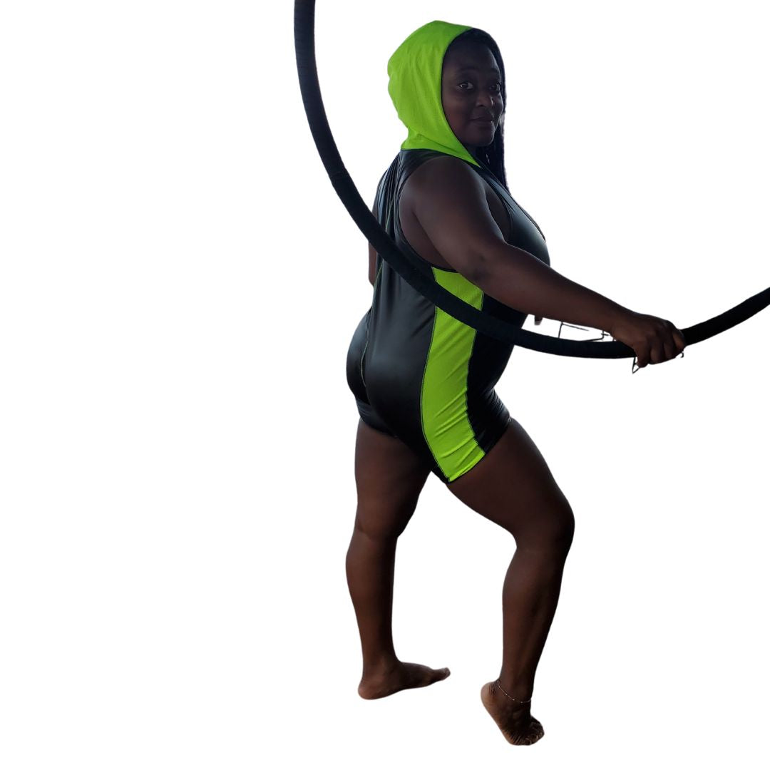 Model wearing Primal Instinct Hooded Singlet with hand on Hoop