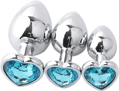Three Steel Heart Jewel Anal Plugs of different sizes with Aqua Blue heart jewels.