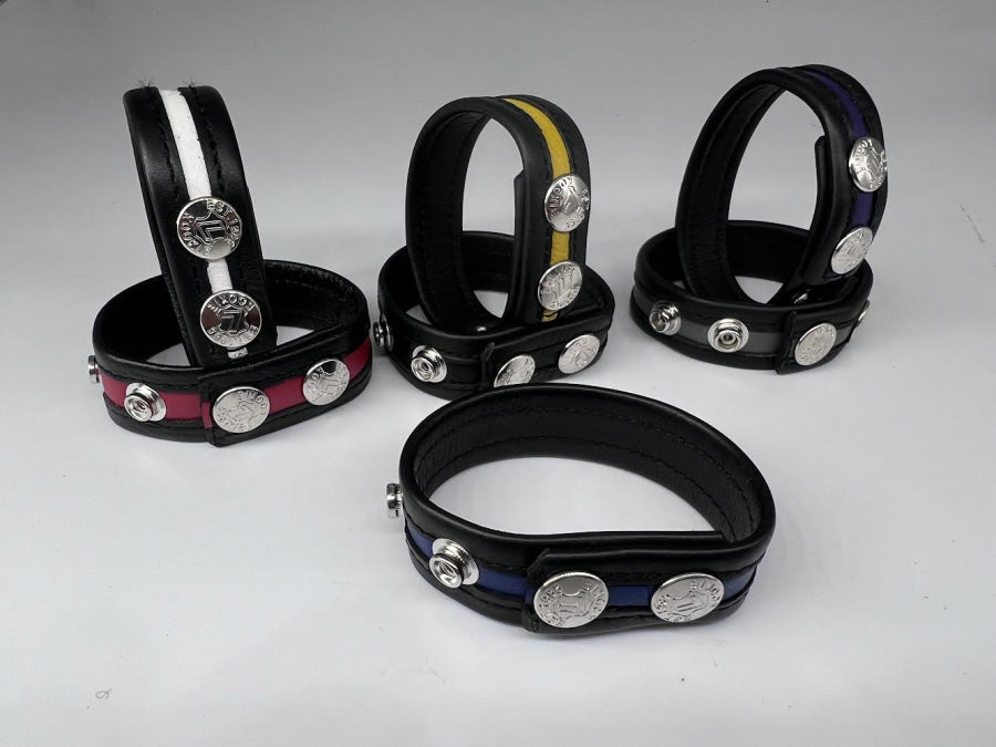 Six closed different colored Stripe Leather Cock Rings.
