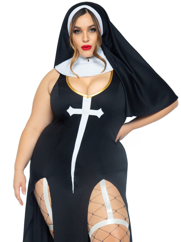 A mid length view of a plus size model wearing the 3 pc. Sultry Sinner Nun Costume with fence net stockings.