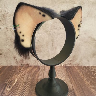 Right ear of Deluxe Vegan Animal Ear headband with black faux fur on stand
