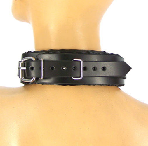 A mannequin displaying the back of the Black Satin Lined Bondage Collar.
