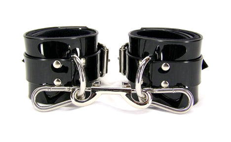 Black PVC Neoprene Lined Bondage Cuffs attached by double ended hook.