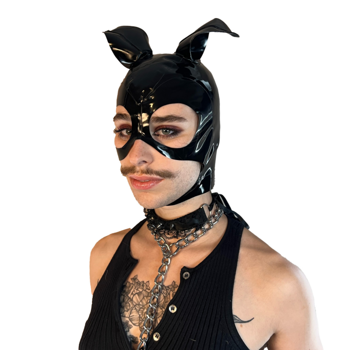 A model wearing black with magnetic ears open mouth and eye basic latex hood, front view.