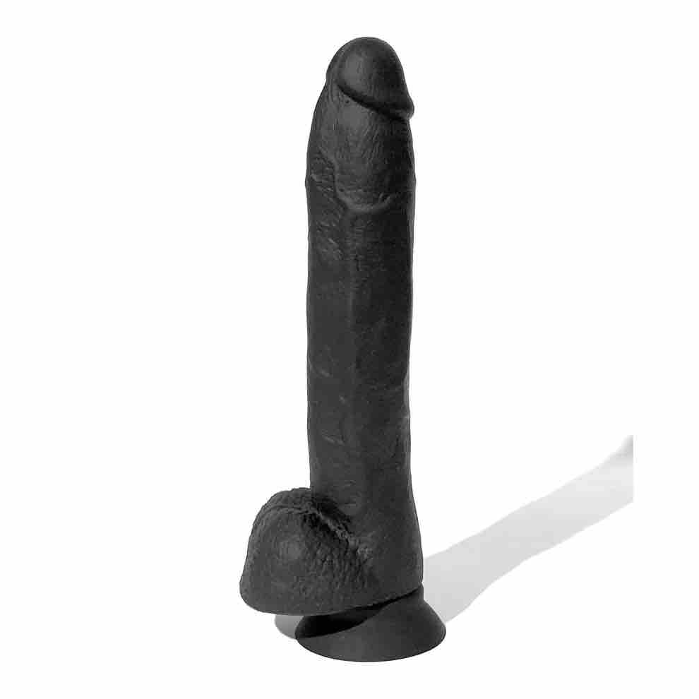 The 10 inch Boneyard Silicone Cock sitting upright on its attached suction cup.