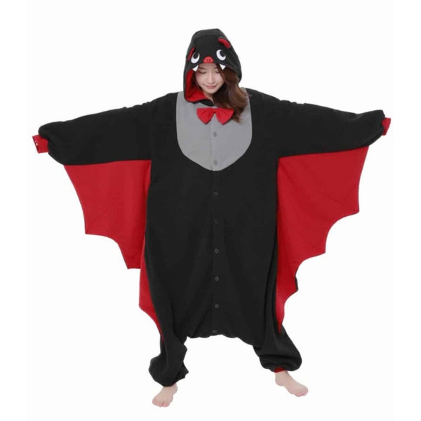 Model wearing bat Kigurumi with both arms extended showing red wings.