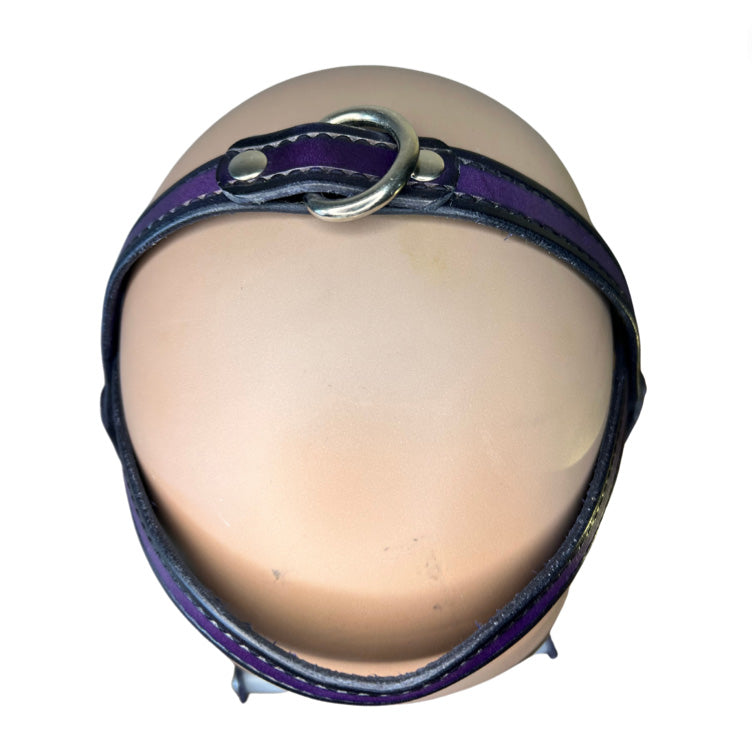 over the head purple leather snap strap of locking bit head harness on mannequin head