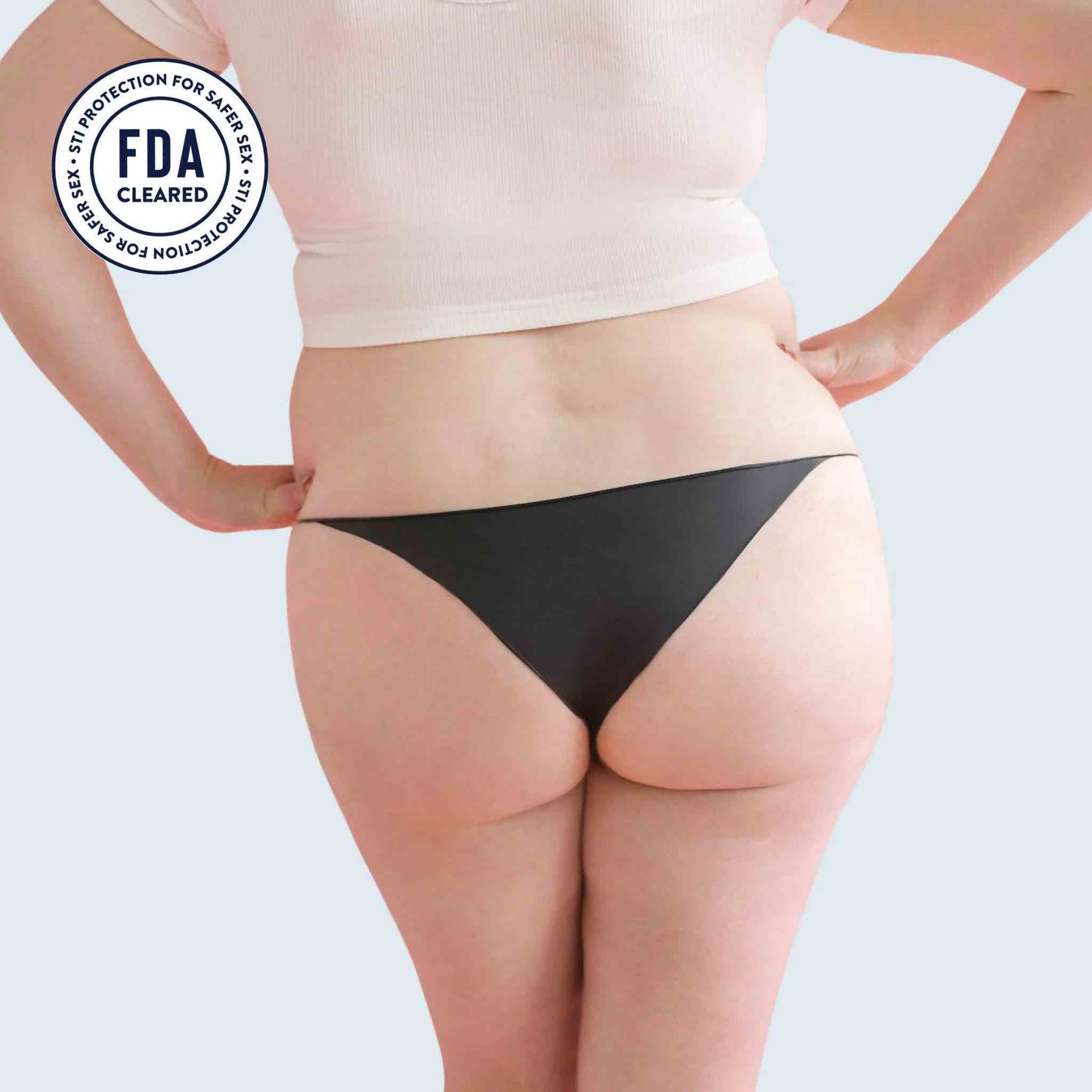 The Opaque Black bikini Lorals Panties For Protection on a plus size model, rear view.