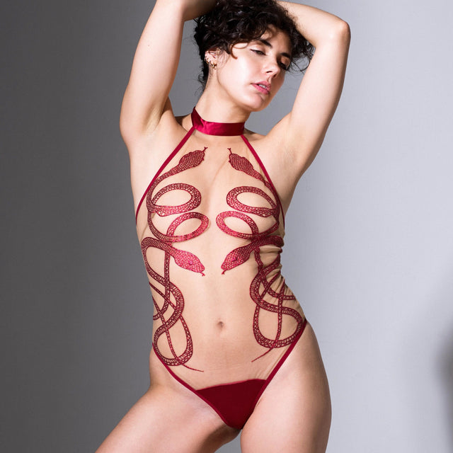 Medusa bodysuit in Butterscotch with Oxblood colored snakes on slender model