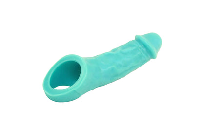 The front of the Turquoise Colossus Vixskin Extender Dildo.
