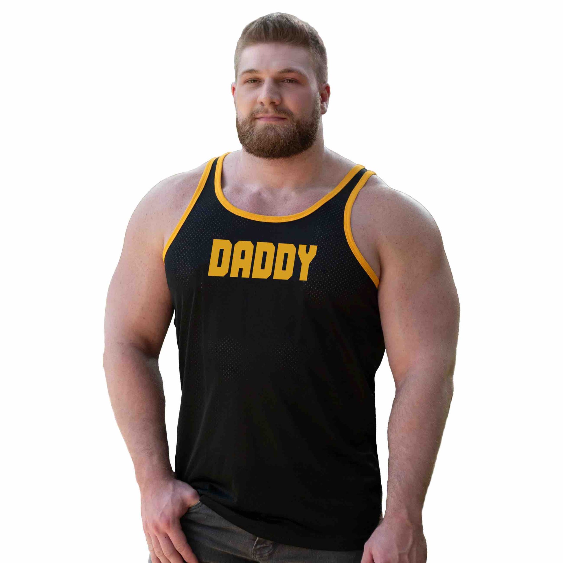 A model wearing the Daddy Air Tank with black jeans, front view.
