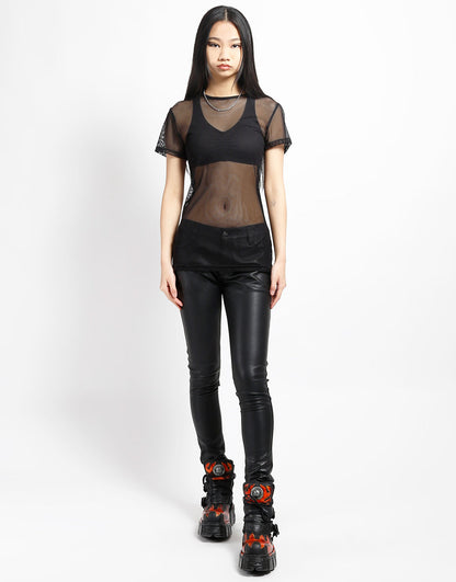 Model wearing the black Short Sleeve Fishnet T-Shirt with black bra and pants, front view.