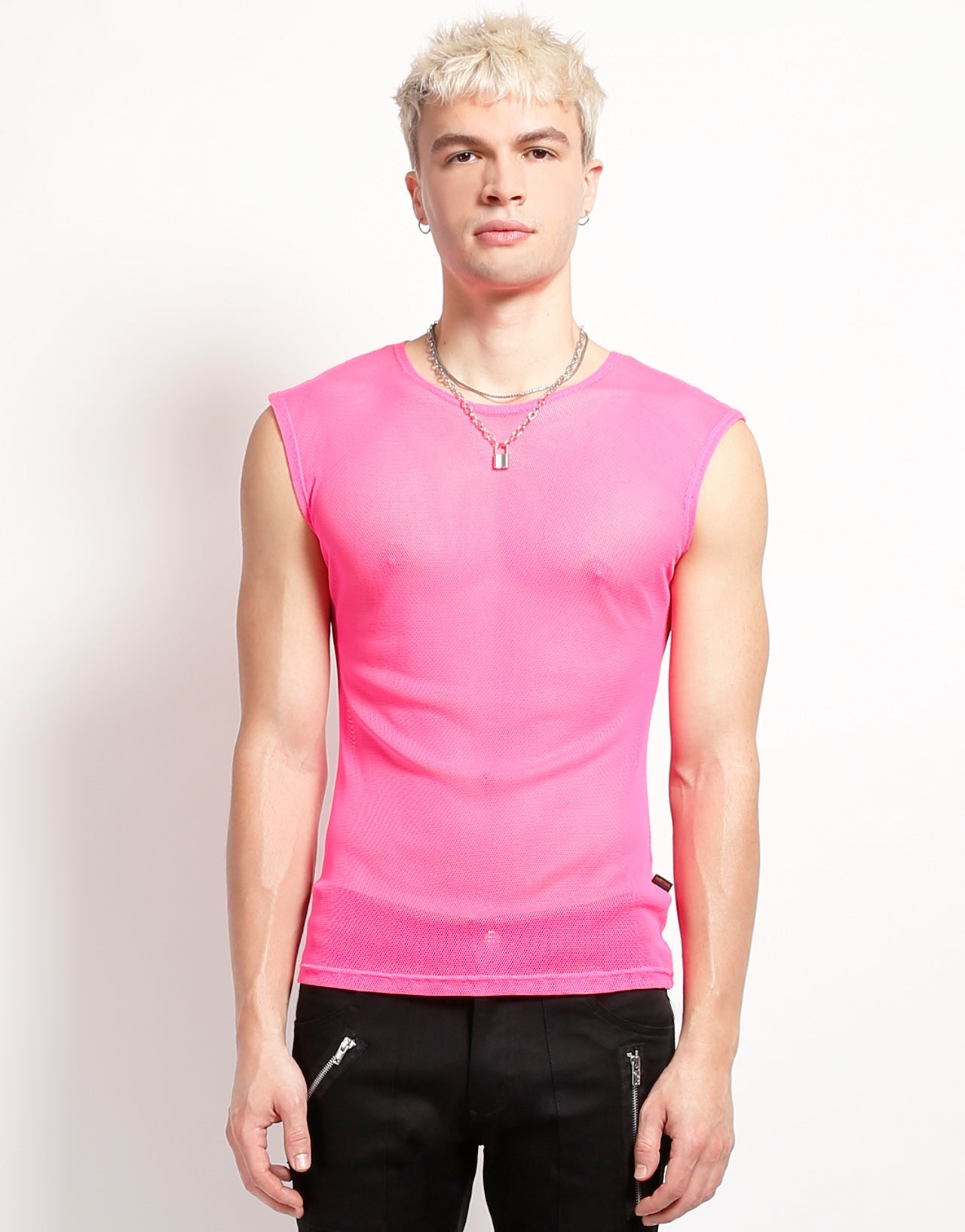 The pink Sleeveless Fishnet Muscle Tank on a model wearing black pants, front view.