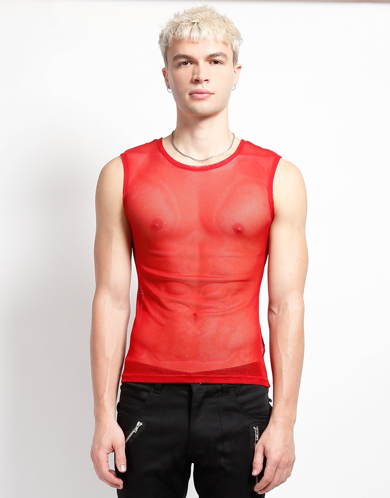 The red Sleeveless Fishnet Muscle Tank on a model wearing black pants, front view.